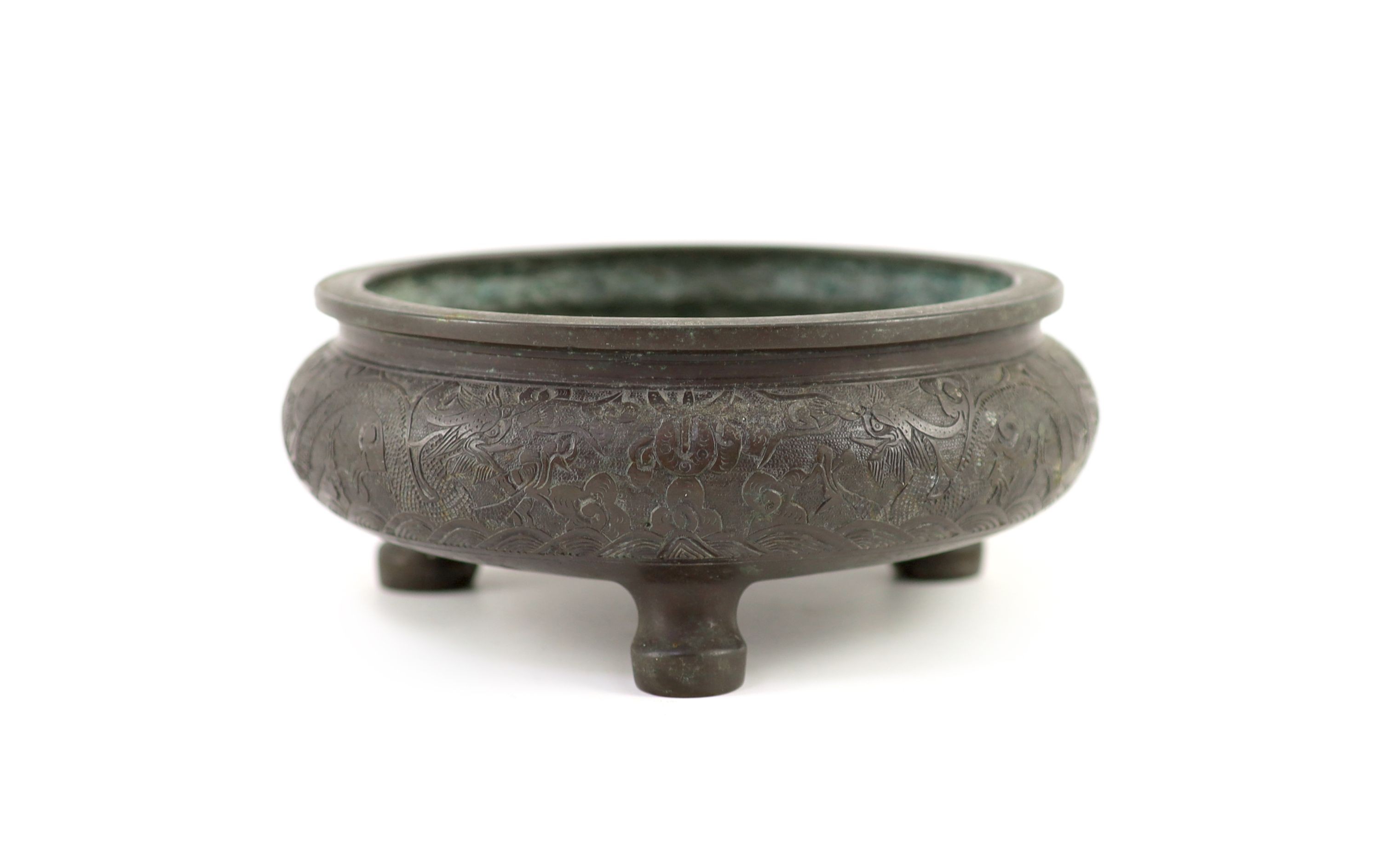 A Chinese bronze tripod censer, ding, 19th century, 20 cm diameter